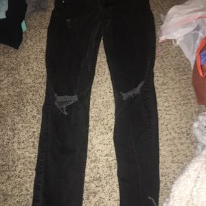 Ripped and Frayed Black skinny Jeans
